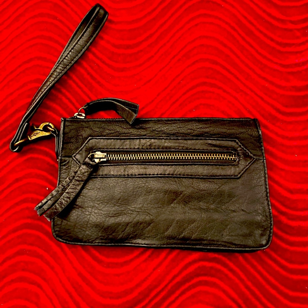 Day & Mood clutch wristlet black in color all leather.
